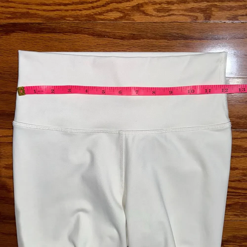 ALO Yoga Ripped Leggings in Off-White Cream